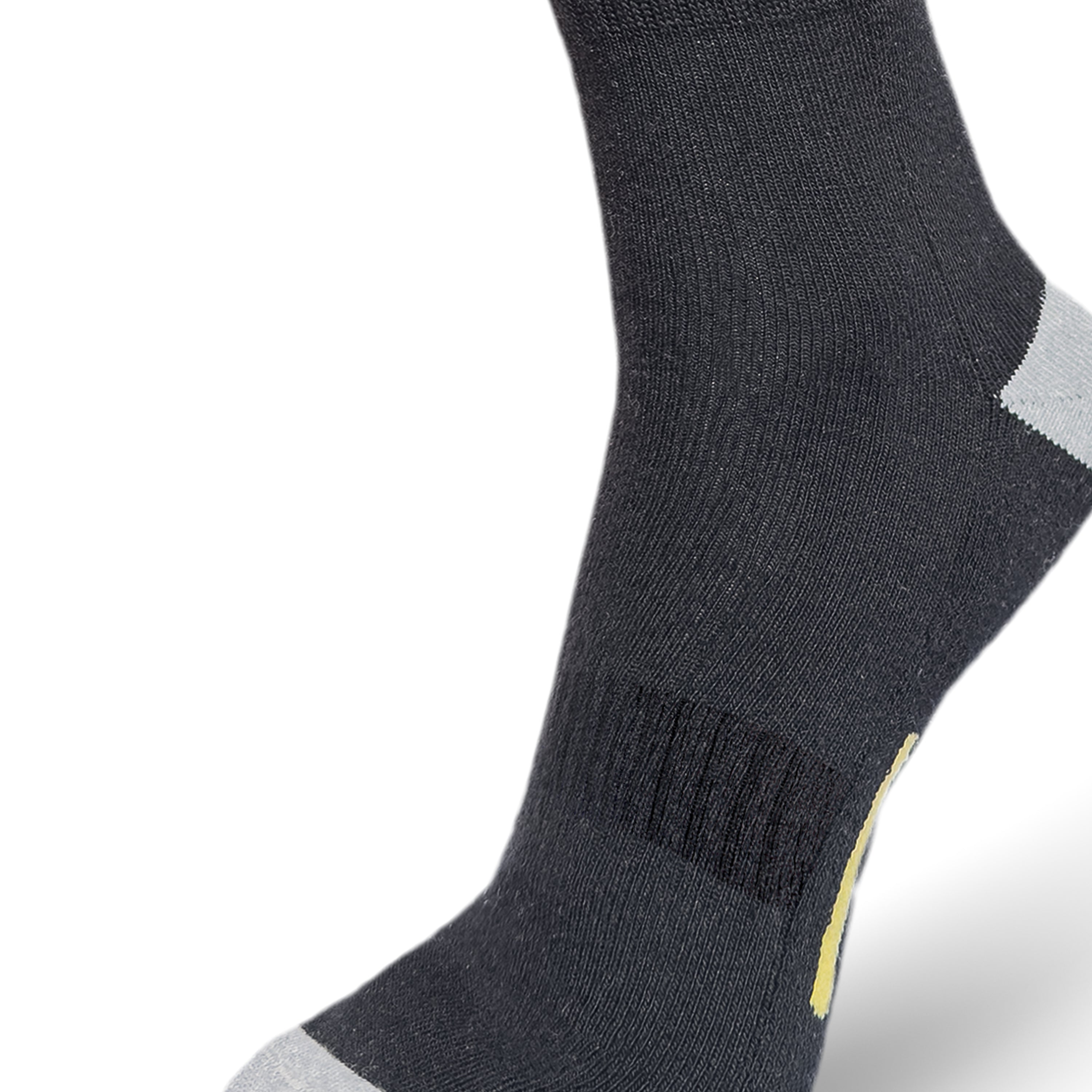 Foot View of the Triumphant sports Champion Series Performance Cricket Socks Crew Length Black Yellow